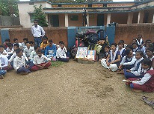 An angry student sitting on lock in school gate
