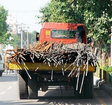 Overloaded trucks, fined by court, then overloaded again