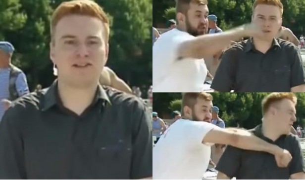russian reporter punched in the face on live tv
