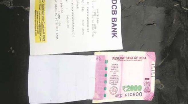 29 Year Old Man Gets Half Printer Rs 2,000 note from DCB ATM in Delhi