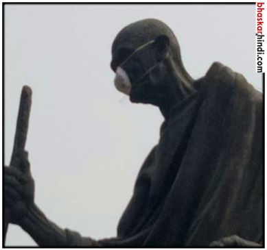 aap suspended leader kapil mishra puts pollution mask on gandhi ji idol