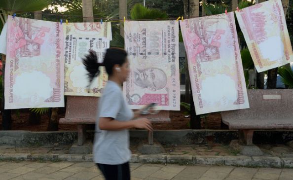 demonetize indian currency used in south africa in election campaign