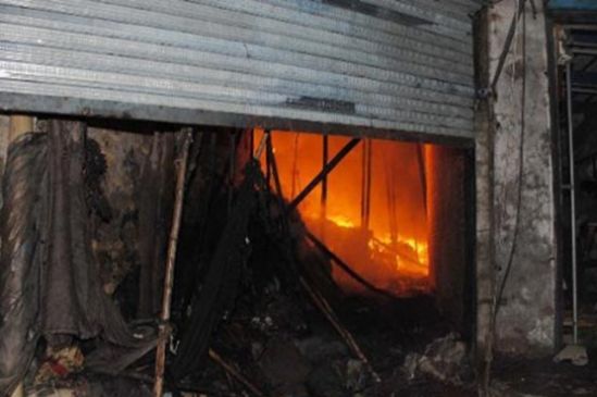accused fire in motor parts shop at night