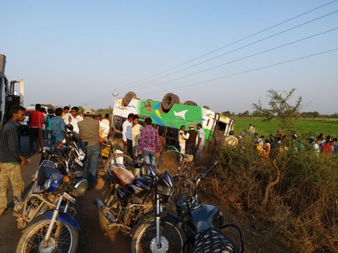 Overload mini bus swaps in an attempt to save the bike rider