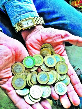 Ten rupees coin not is running in market, people disturb