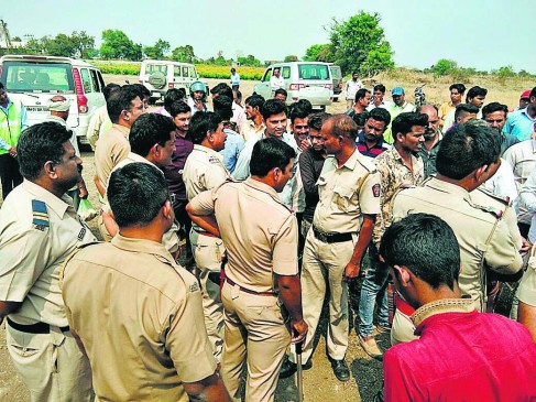 Bulldozers run on farmers standing crop in nagpur district