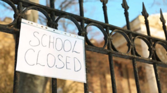 Suspended officer in granting 2 crores when the school was closed