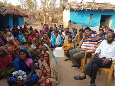villagers attacked on cop,When he was arresting a liquor smuggler