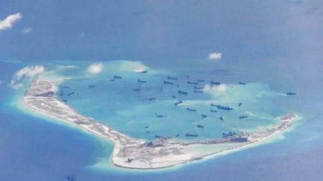China deploys missile systems in disputed South China Sea