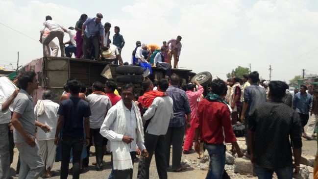 Collision with road dividers bus overturned, one died 11 injured