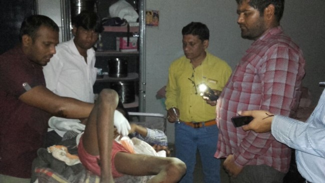 treatment was given to injured under the light of mobile torch