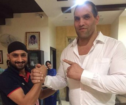 Harbhajan Singh arm-wrestles with WWE superstar The Great Khali