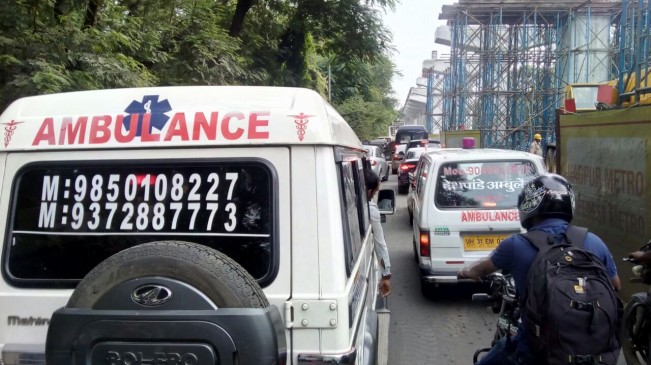 Terrific traffic :  Ambulance hanging in orange city, Patient was on oxygen