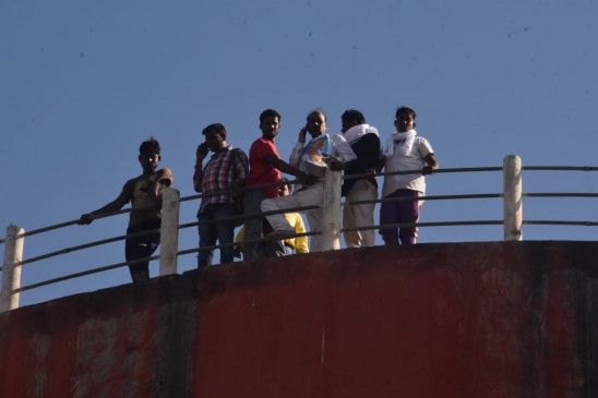 municipal councilor climbed on the tank and started demanding for some works municipal councilor climbed on the tank and started demanding for some works