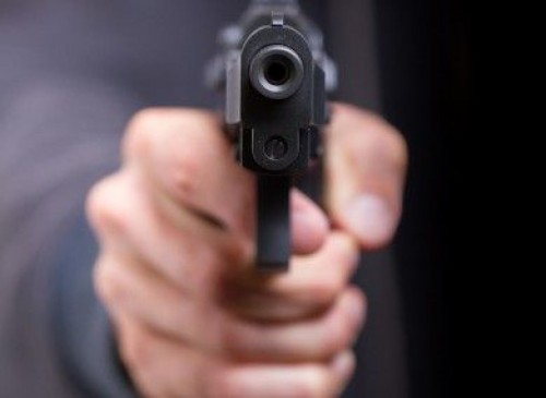 A trainee doctor Outraged from breakup, standing gun on colleague