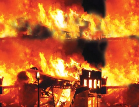 82-year-old woman dies in fire at multi-story building, 19 injured in hospital