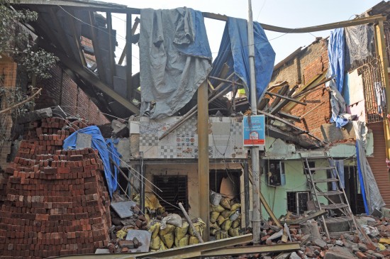Three killed and eight injured in building collapse during repair