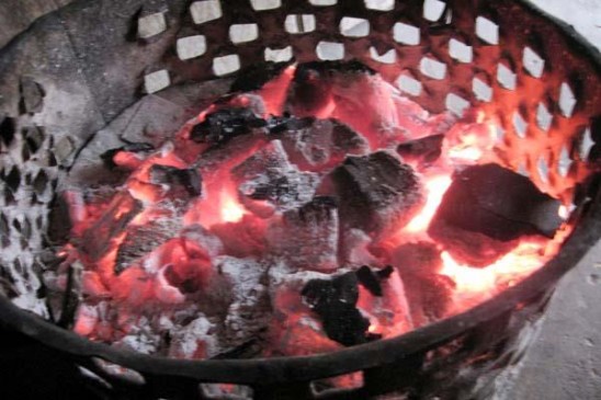 Hearth burnt in closed room, innocent death due to Smothering