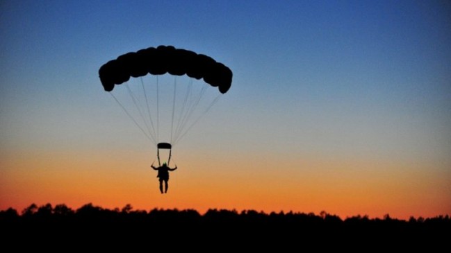 Police and ATS investigate of two suspects landing from the parachute