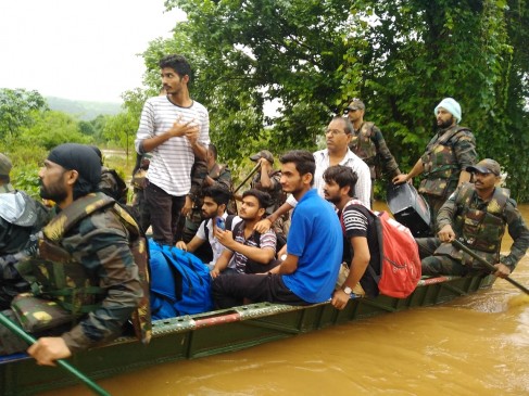Maharashtra minister seen taking selfie in flood affected area