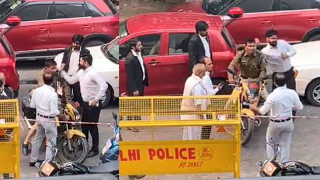 वीडियो: दिल्ली में काले कोट वालों की गुंडागर्दी, पुलिसकर्मी को घेरा, जड़े थप्पड़