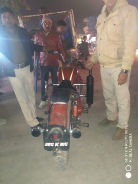 The bullet was written on the number plate of the two-wheeler.