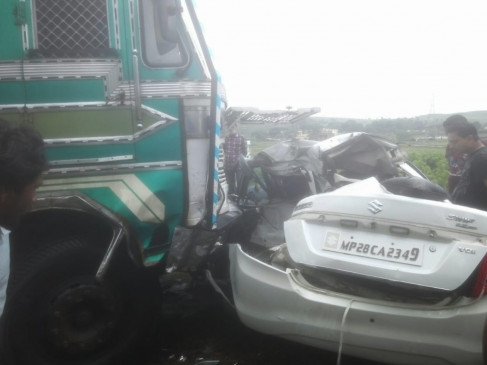 Car collided with standing truck, two dead along with constable