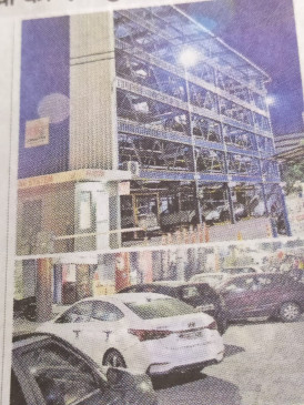 Showcasing multilevel parking vehicles parked on the road - top officials apathy - passers by Showcasing multilevel parking vehicles parked on the road - top officials apathy - passers by