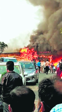 Spacewood Company fire, large amount of wood laid