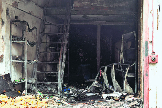 Shop fire, woman burnt to death in adjacent house