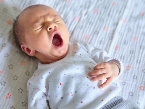 Newborn found in bushes, police rushed to hospital