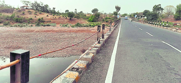 Railing of bridge broken, work going on on bamboo for a year