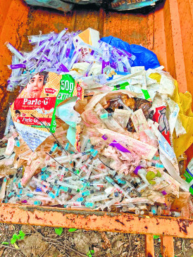 Biomedical waste piled up outside vaccine center, calling for infection