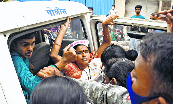 Scuffle with agitating women, torn clothes