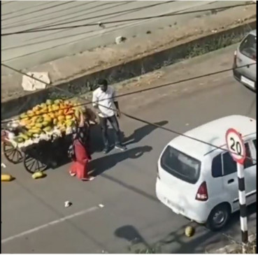 After hitting the car, the coconut was thrown from the poors handcart, if it was not filled