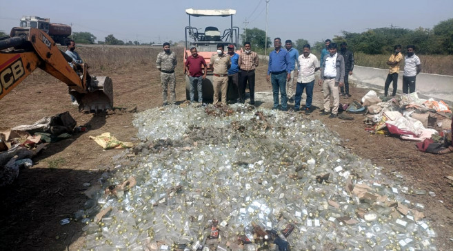 Bulldozer run on seized liquor worth lakhs