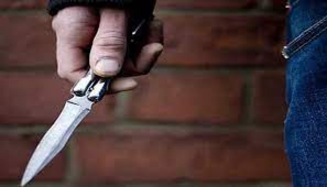Attacked with knife on young man in minor dispute - injured