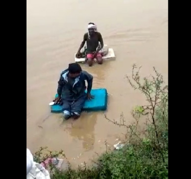 To marry bride riding on a thermocol sheet, due to close the roads after heavy rains