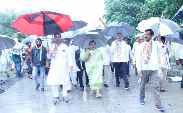 Full freedom pride padyatra by putting umbrella in the rain Full freedom pride padyatra by putting umbrella in the rain