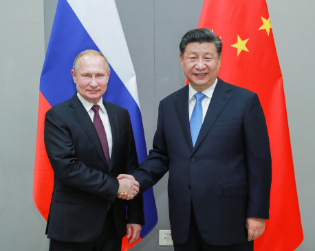 पुतिन ने शिखर सम्मेलन में राष्ट्रपति शी जिनपिंग से मुलाकात की