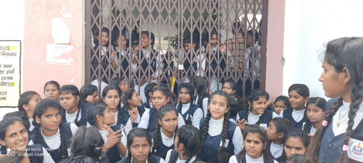 The students put the lock in the school, did not obey the DEO, the transferred principal came and got it opened