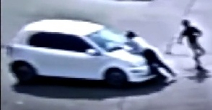 Traffic cop dragged on car bonnet in Indore