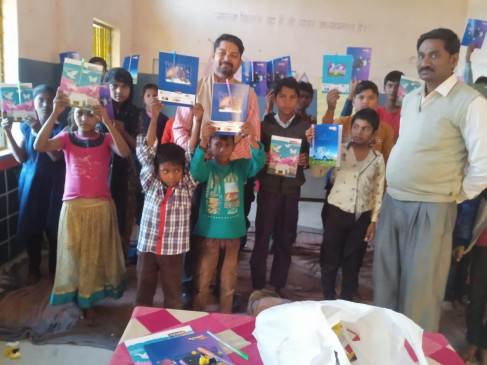 Social worker celebrated his birthday by distributing stationery material to children