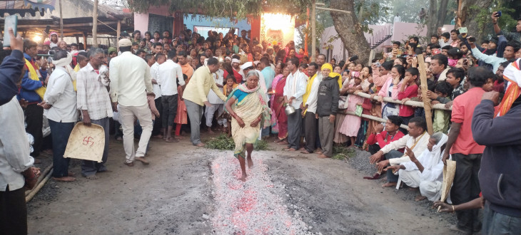 Devotees walk on the coals after the vow is fulfilled