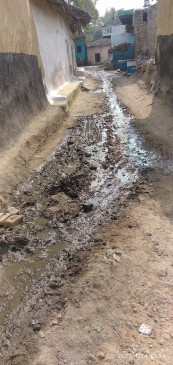 Due to non-construction of drains, the dirt coming out of the houses on the road