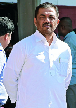 Kedar sat wearing a black ribbon in the Deputy Chief Ministers program